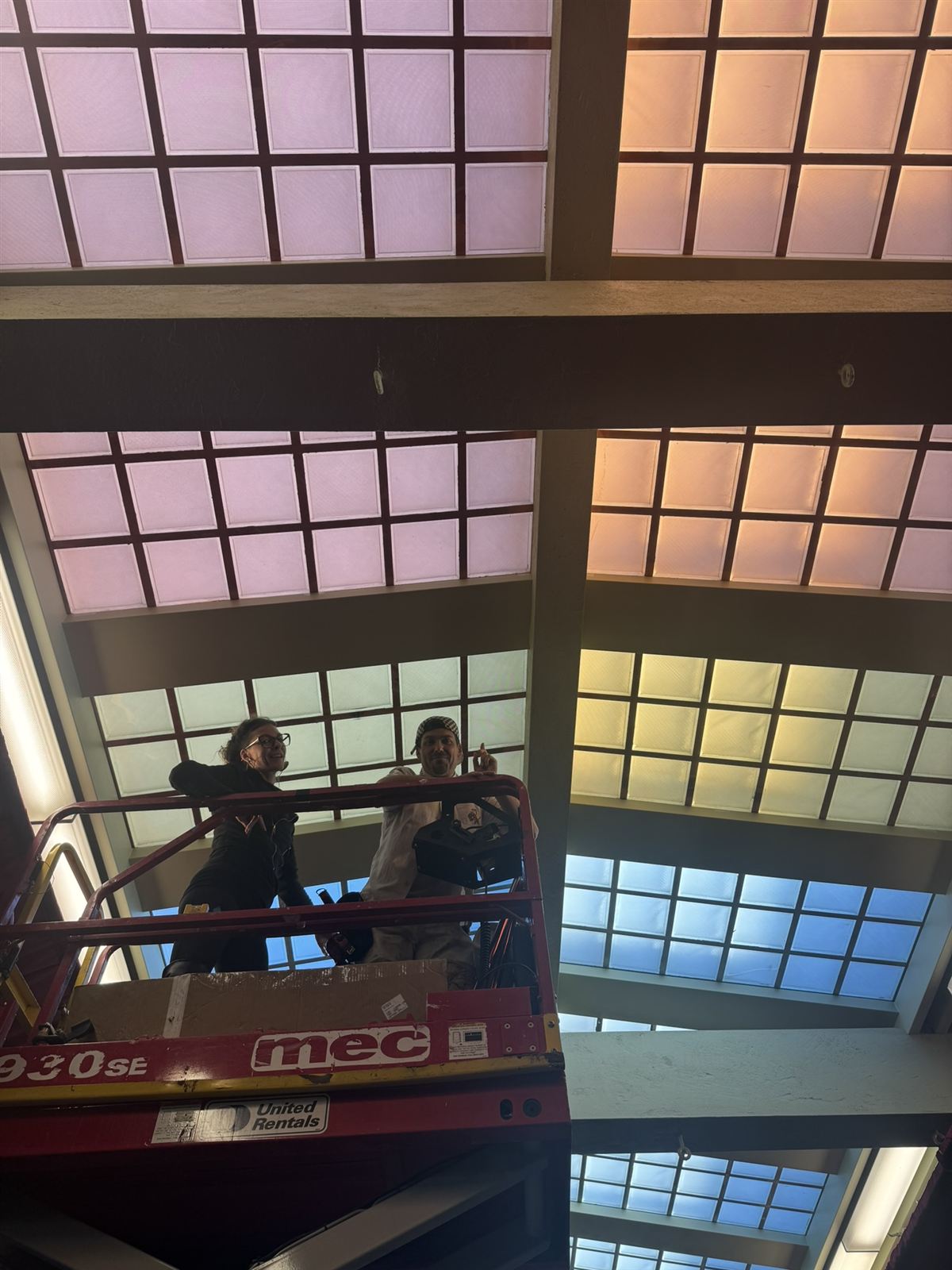 Skylight gels seen from a scissor lift during install