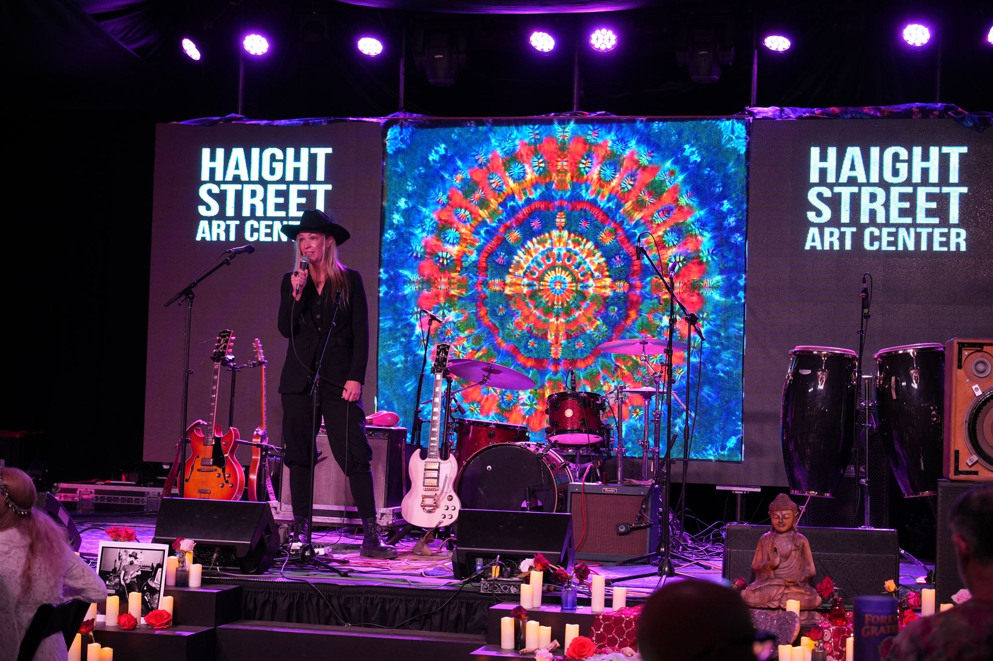 Floral Blush Mandala backlit on stage during a live set