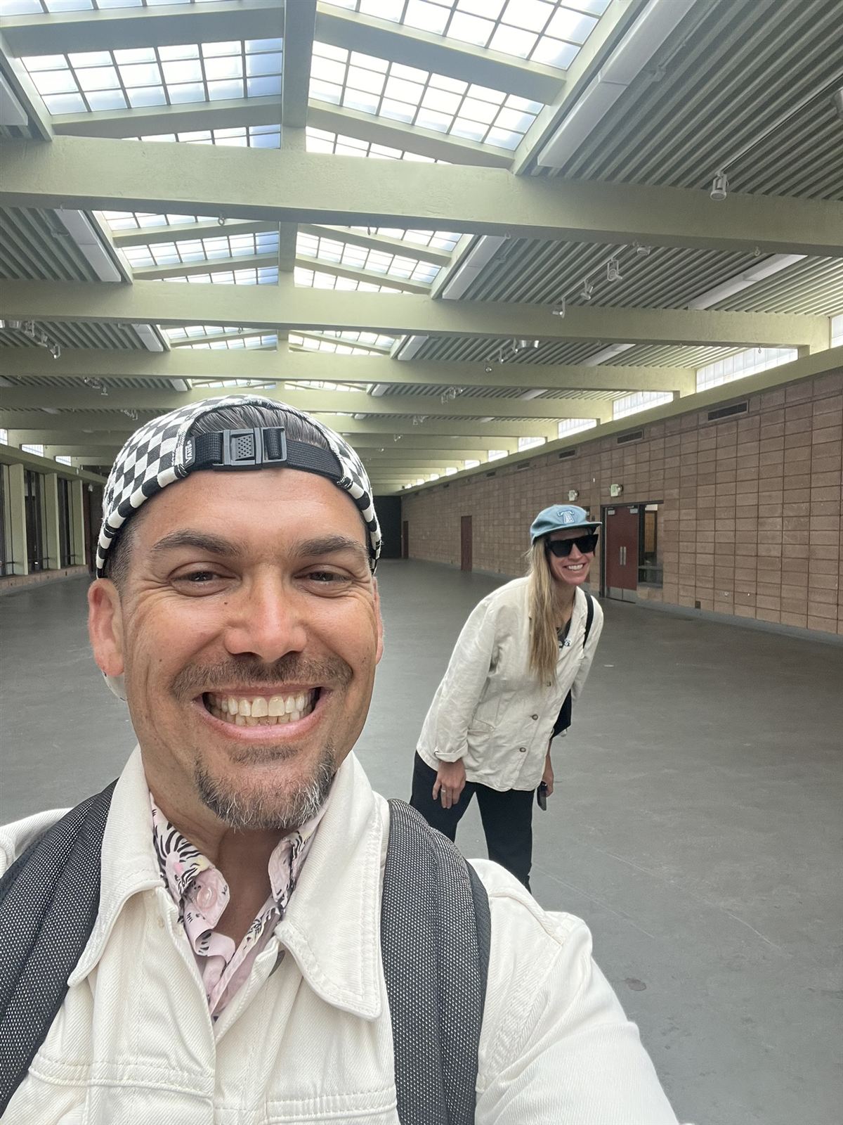 Brian Scharf and Kelly Harris in the empty Hall of Flowers, May 13