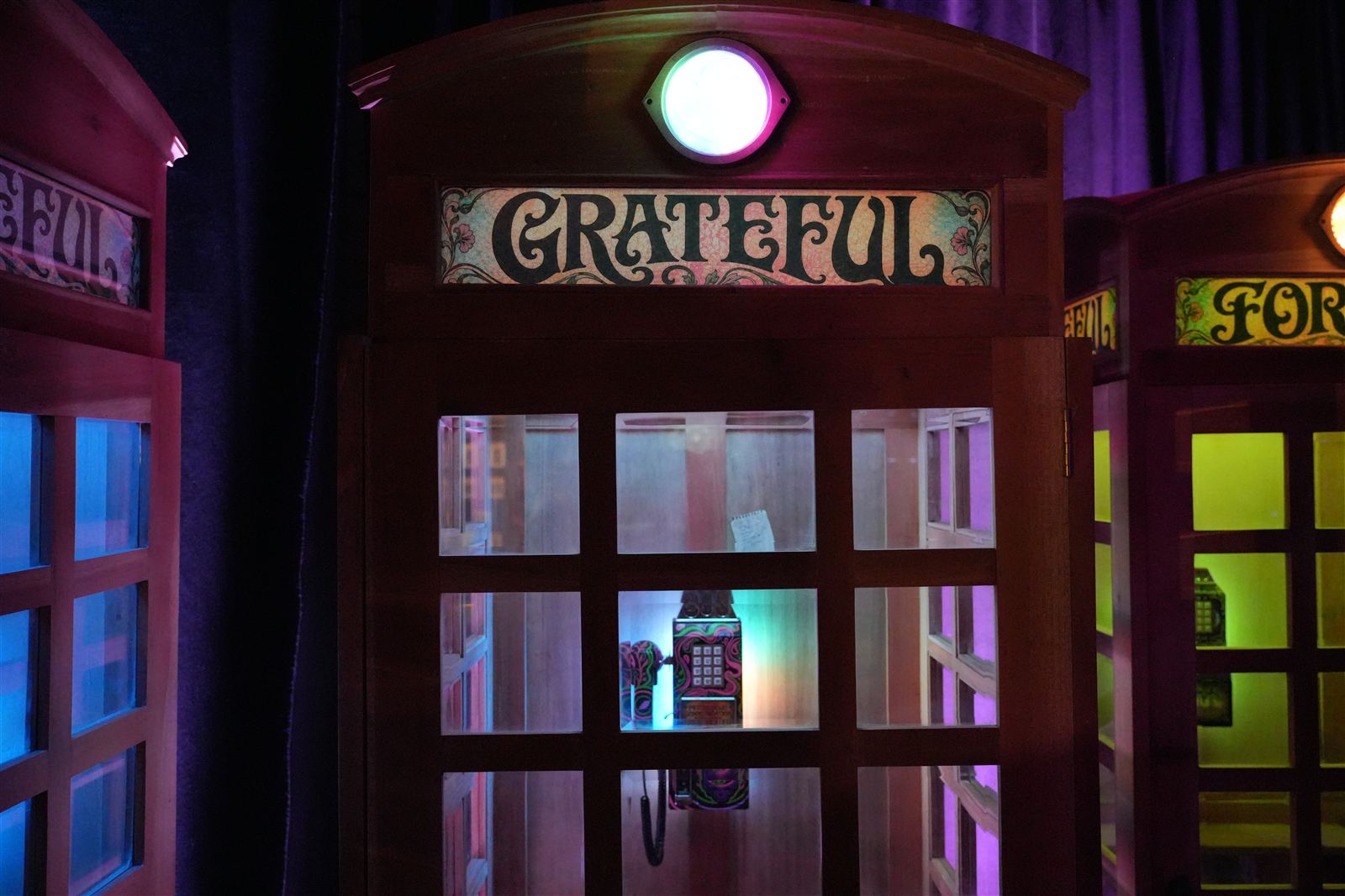 GRATEFUL telephone booth with rainbow glass